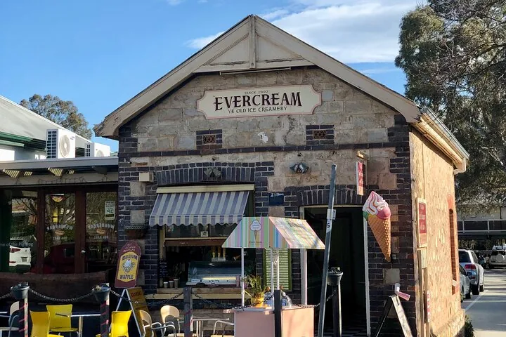The sandstone Evercream building with outdoor seating