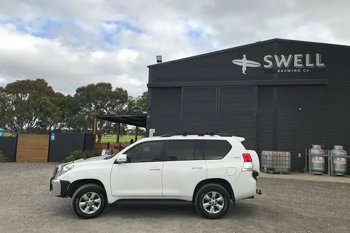 The tour car outside a brewery on a private wine day
